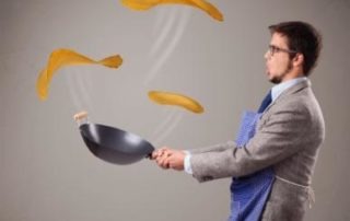 Boy making pancakes