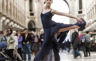 Elegant classical dancer performing in the city