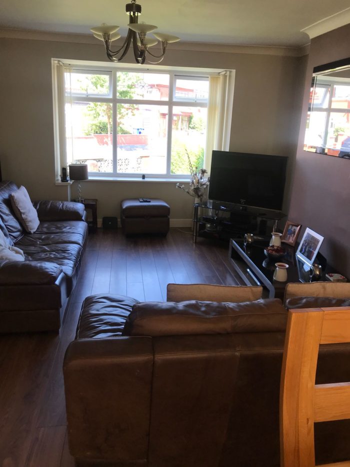 Living room and TV in a home stay hosts accommodation